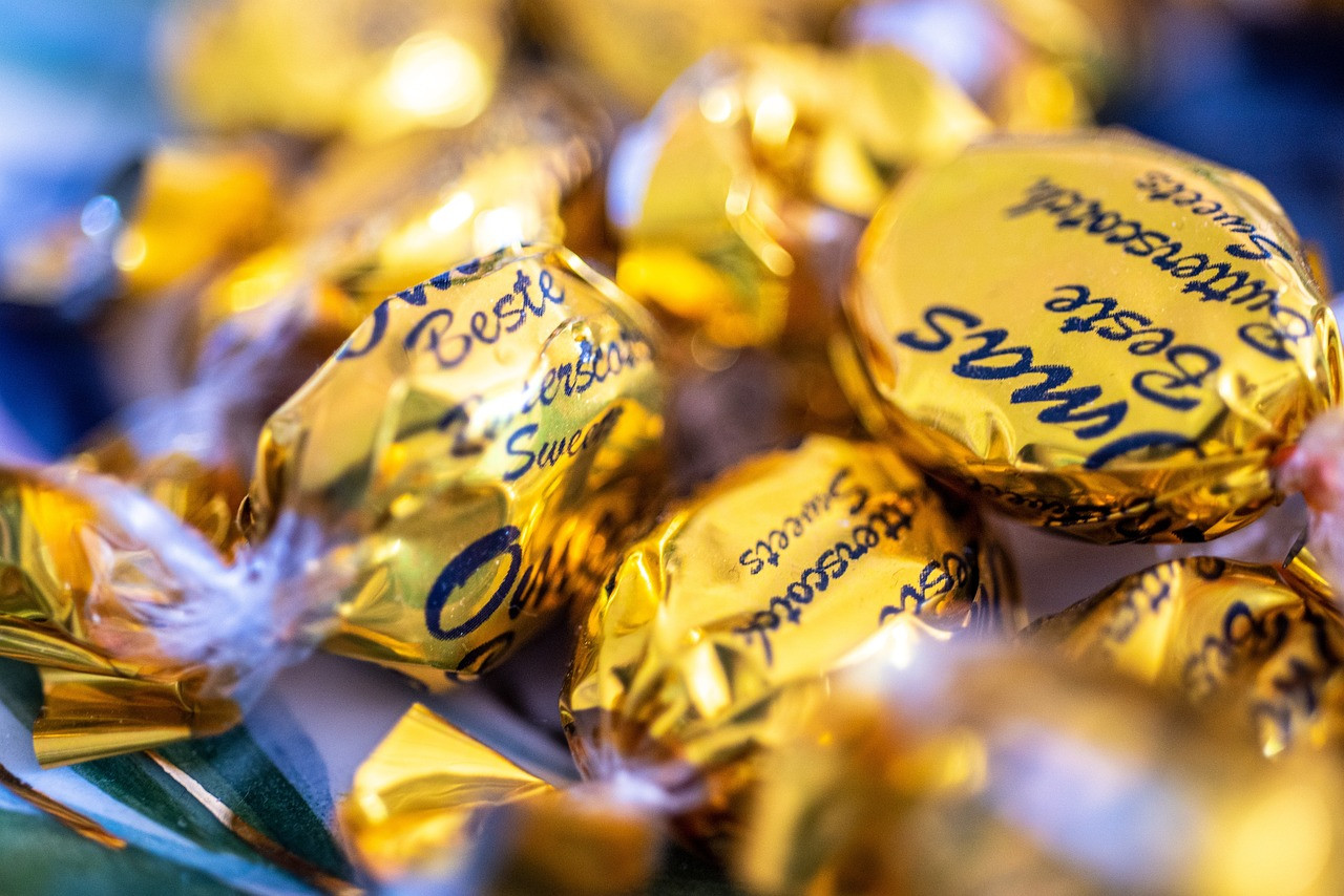 sweets, wrapper, candy, yellow, lollipop, confectionery, sugar, color, sweet, wrapper, wrapper, wrapper, wrapper, wrapper, candy