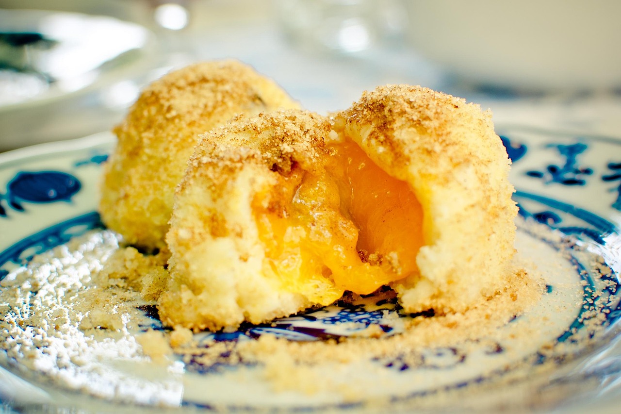 apricot dumplings, apricot dumpling, dumplings, apricots, apricot, meal, food, potato batter, cooked, breadcrumbs, crumbs