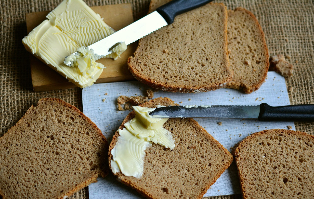 loaf, butter, butter bread, whole grain bread, bread slices, lubricate, nourishment, fat, carbohydrates, food, loaf of bread, disc, wheat, meal, fat, fat, fat, fat, fat, carbohydrates, carbohydrates, carbohydrates, carbohydrates